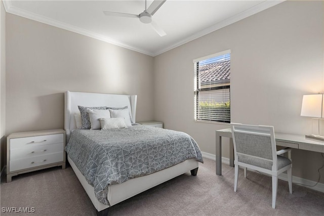 carpeted bedroom with ceiling fan and ornamental molding