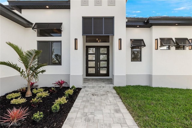 doorway to property with french doors