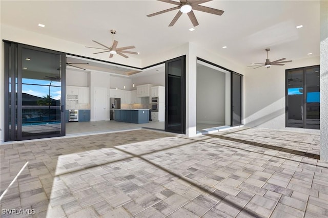 view of patio / terrace with ceiling fan