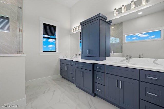 bathroom featuring vanity and tiled shower