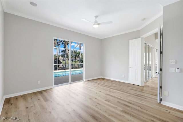 spare room featuring light hardwood / wood-style floors, ceiling fan, and ornamental molding