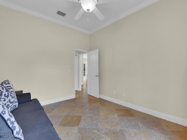 interior space with ceiling fan and crown molding