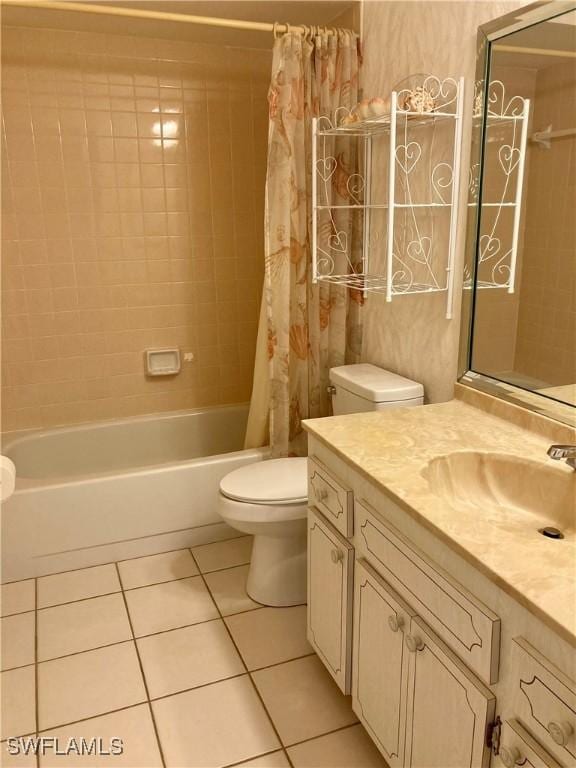 full bathroom featuring tile patterned floors, vanity, toilet, and shower / tub combo with curtain