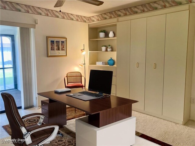 3923 SE 11th Ave Unit 304, Cape Coral, FL 33904 - office space featuring built in shelves, a ceiling fan, and light colored carpet