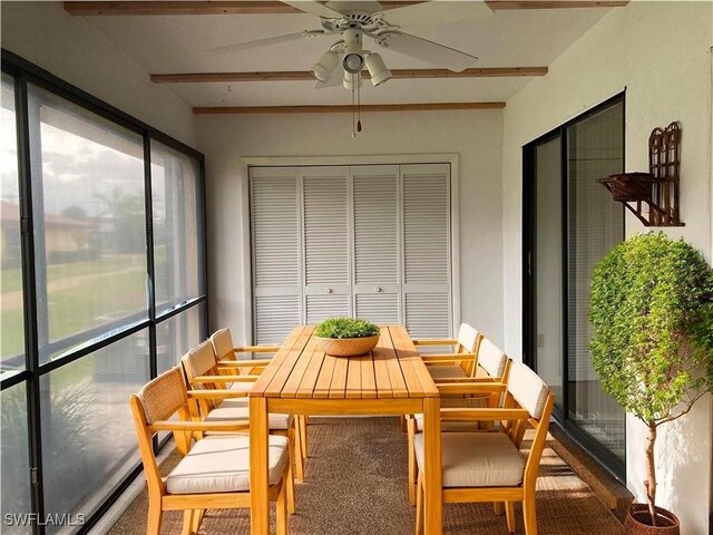 3923 SE 11th Ave Unit 304, Cape Coral, FL 33904 - sunroom featuring beamed ceiling