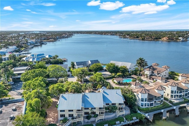 bird's eye view with a water view