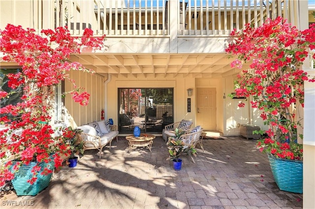 view of patio / terrace with a balcony