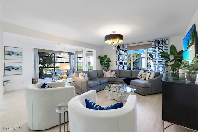 living room with light hardwood / wood-style floors