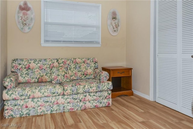 sitting room featuring light hardwood / wood-style floors