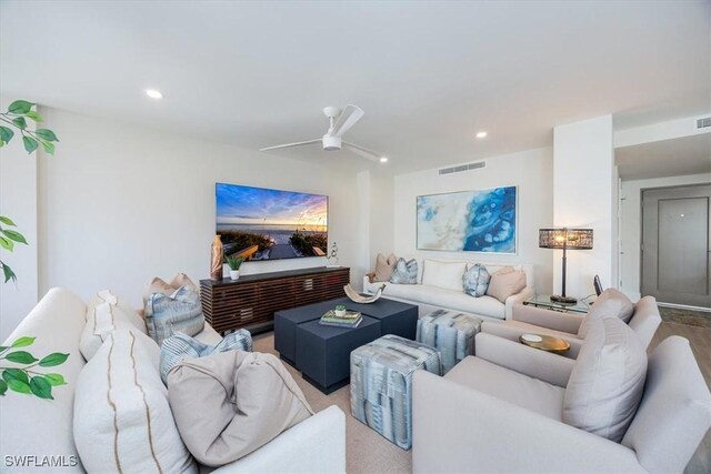 living room featuring ceiling fan