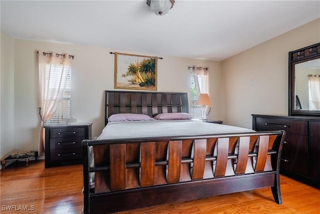 bedroom with light wood-type flooring