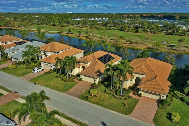 drone / aerial view with a water view