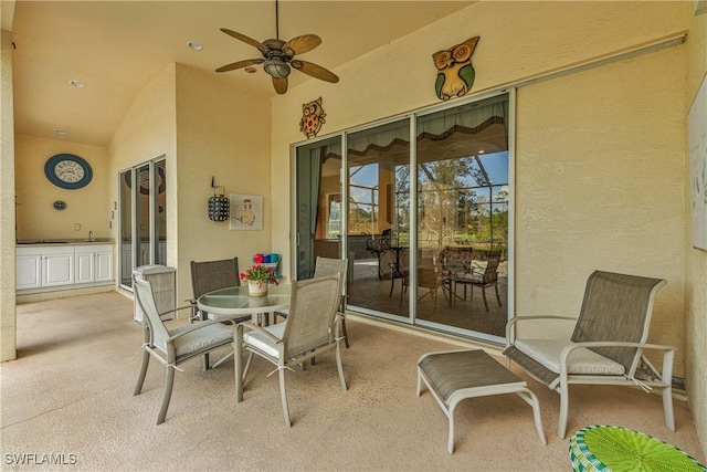 view of patio / terrace with ceiling fan