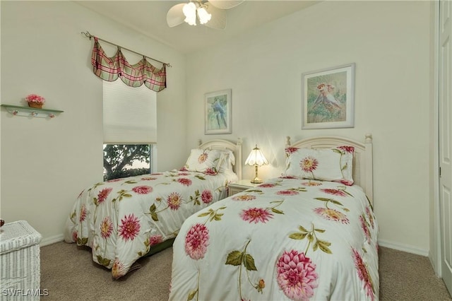 bedroom with ceiling fan and carpet