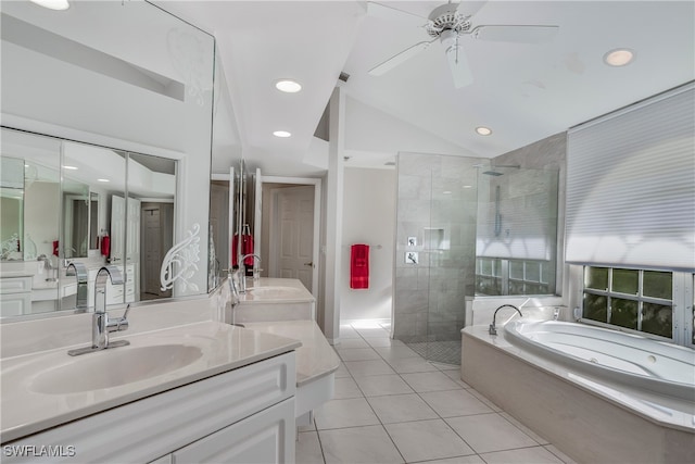 5210 Sands Blvd, Cape Coral, FL 33914 - full bathroom featuring a garden tub, vanity, a shower stall, vaulted ceiling, and tile patterned flooring