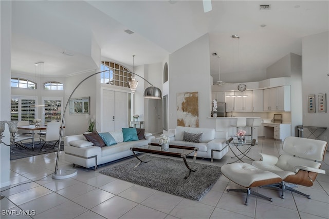 5210 Sands Blvd, Cape Coral, FL 33914 - living room with high vaulted ceiling, ceiling fan, and light tile patterned floors