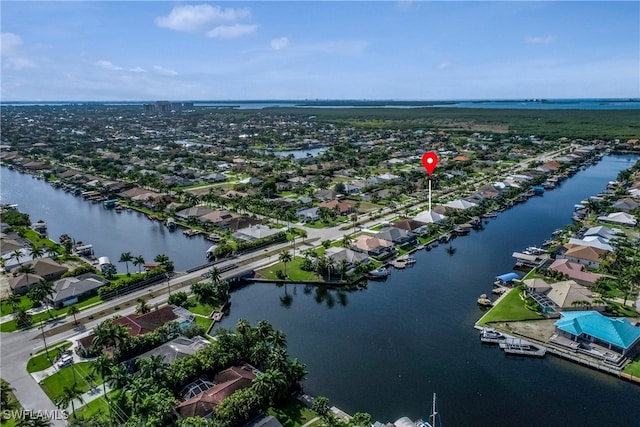 5210 Sands Blvd, Cape Coral, FL 33914 - aerial perspective of suburban area featuring a large body of water