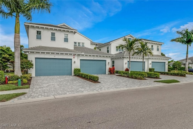 view of front of property with a garage