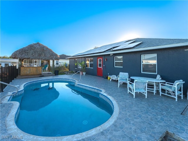 view of swimming pool with a gazebo and a patio area