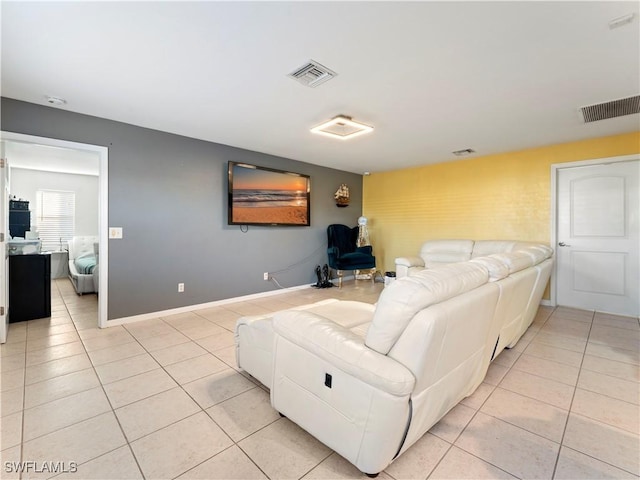 living room with light tile patterned floors