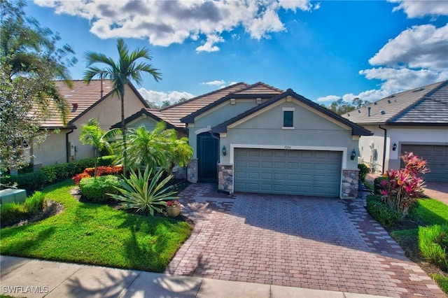 view of front of property with a garage