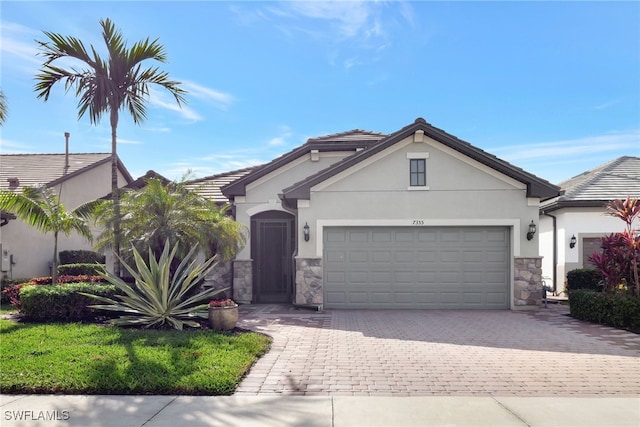 view of front of home with a garage