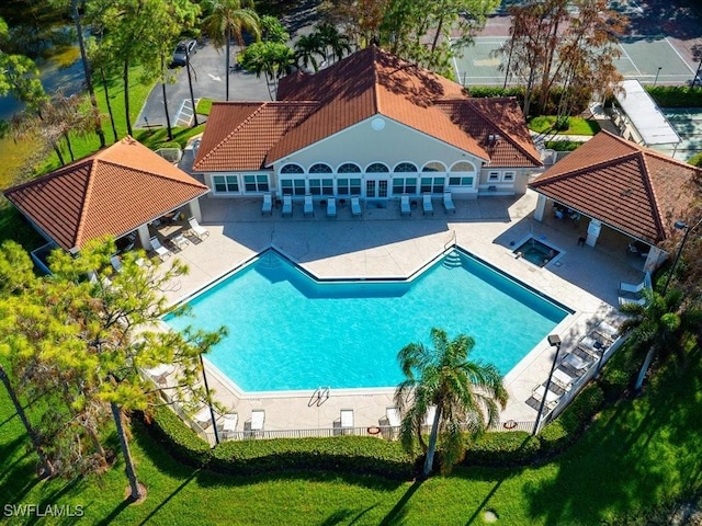 view of swimming pool featuring a patio area