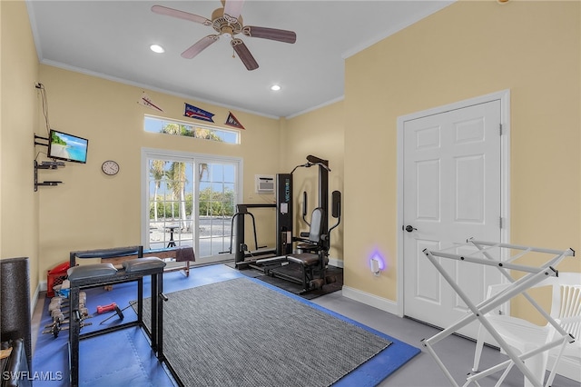 workout room featuring ceiling fan and ornamental molding