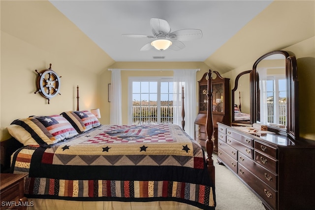 bedroom with access to exterior, ceiling fan, light carpet, and lofted ceiling