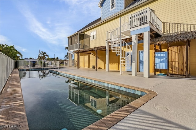 view of swimming pool with a patio