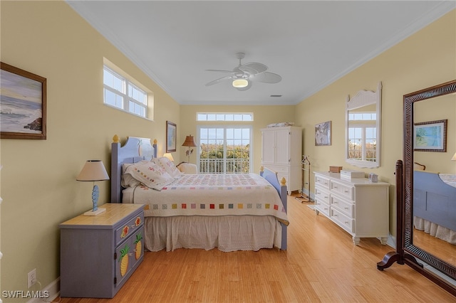 bedroom with ceiling fan, light hardwood / wood-style floors, and crown molding