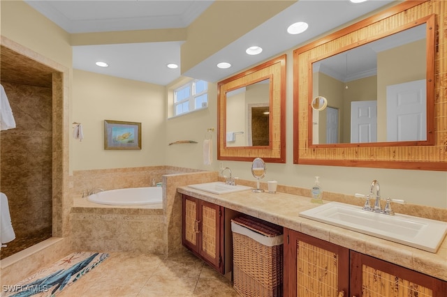 bathroom with tile patterned flooring, vanity, crown molding, and tiled tub