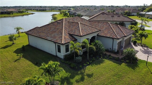 drone / aerial view with a water view