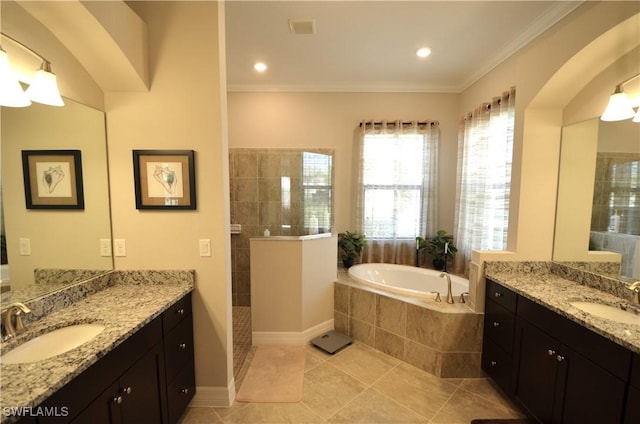 bathroom with tile patterned flooring, vanity, shower with separate bathtub, and crown molding