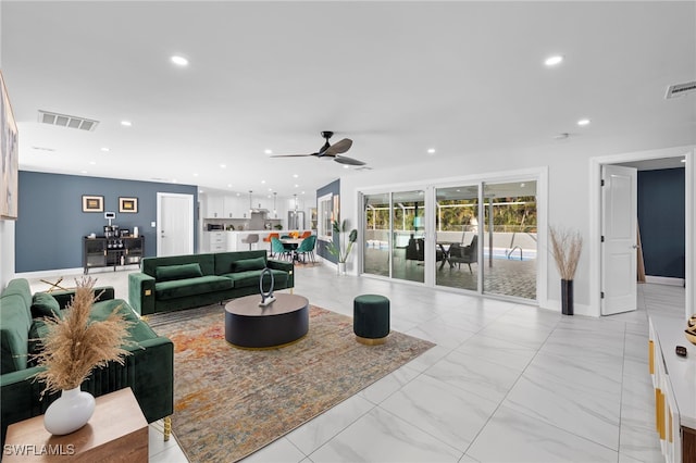 living room with ceiling fan