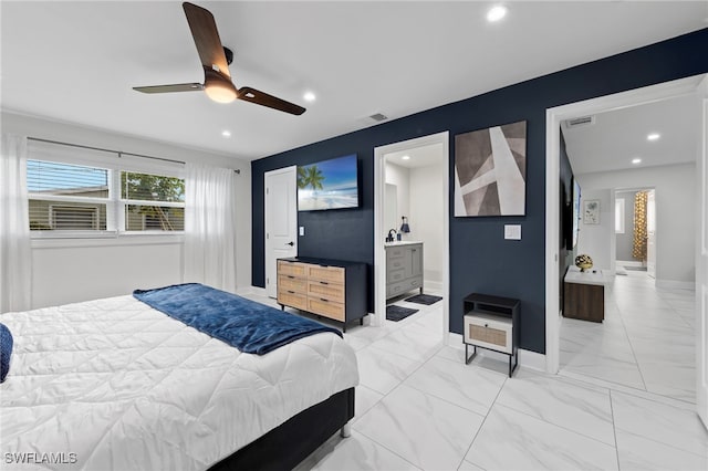 bedroom with ceiling fan and ensuite bathroom