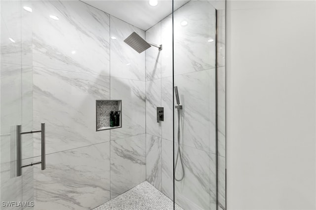 bathroom with an enclosed shower