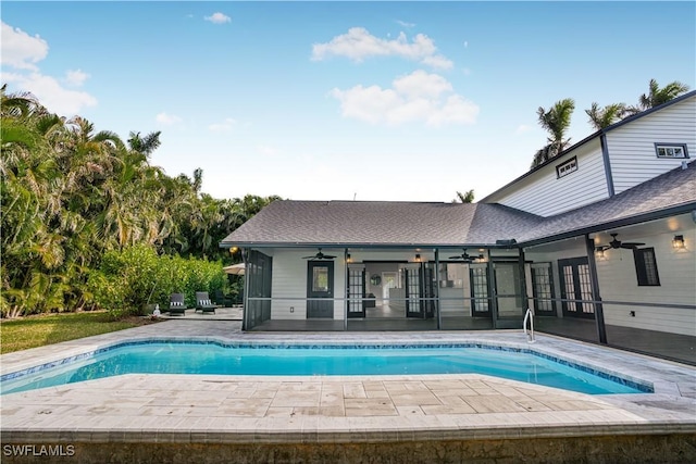 pool featuring a patio, french doors, and a ceiling fan