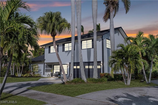 view of front of home featuring concrete driveway