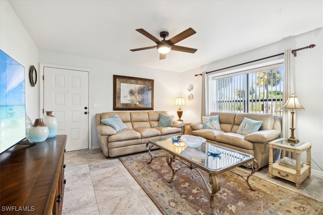 living room featuring ceiling fan