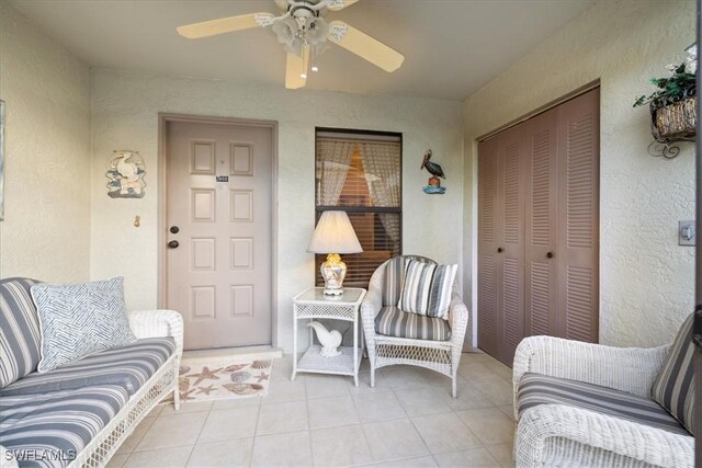 exterior space featuring ceiling fan