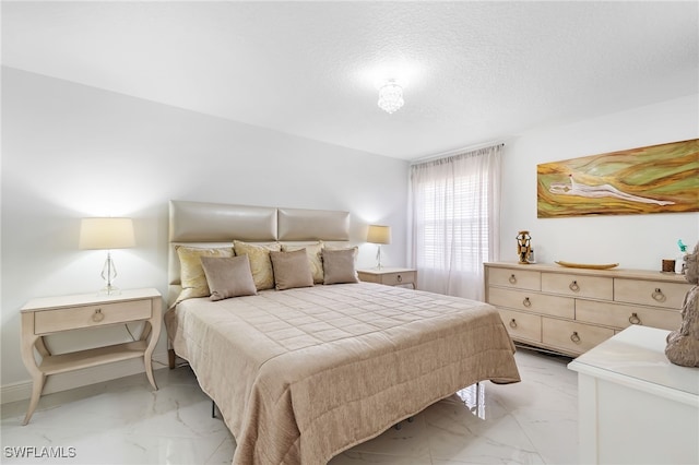 bedroom with a textured ceiling