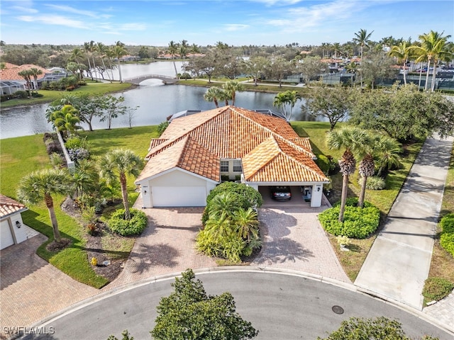 drone / aerial view with a water view