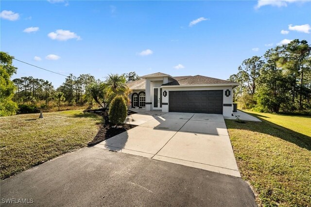 view of front facade featuring a garage and a front lawn