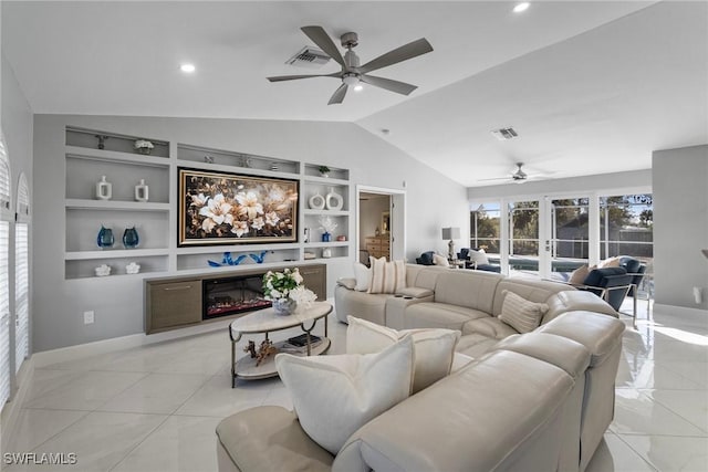 living room with built in shelves, ceiling fan, vaulted ceiling, and french doors