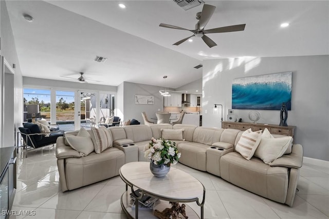 living room with french doors, ceiling fan, vaulted ceiling, and light tile patterned floors