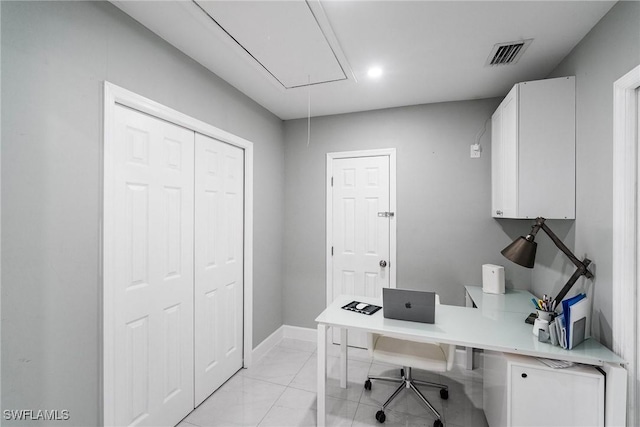 office area with attic access, marble finish floor, visible vents, and baseboards