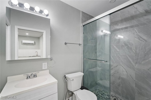 bathroom featuring a stall shower, a wall mounted air conditioner, vanity, and toilet