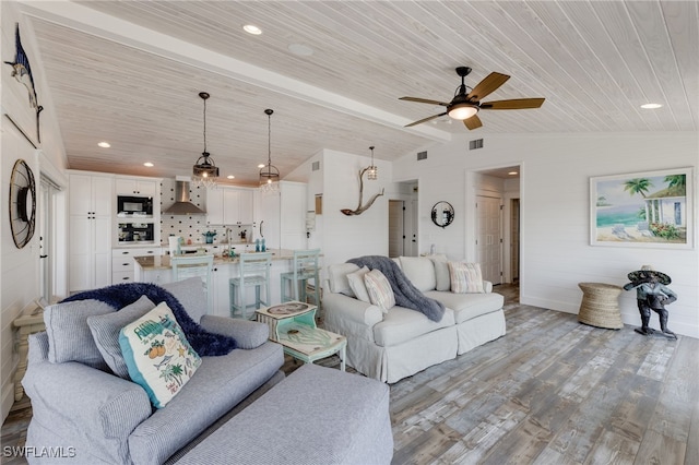 living room featuring ceiling fan, light hardwood / wood-style flooring, wooden ceiling, and lofted ceiling