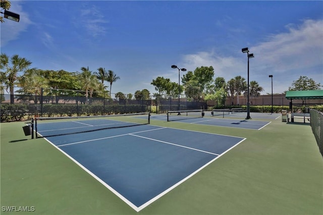 view of tennis court with basketball court